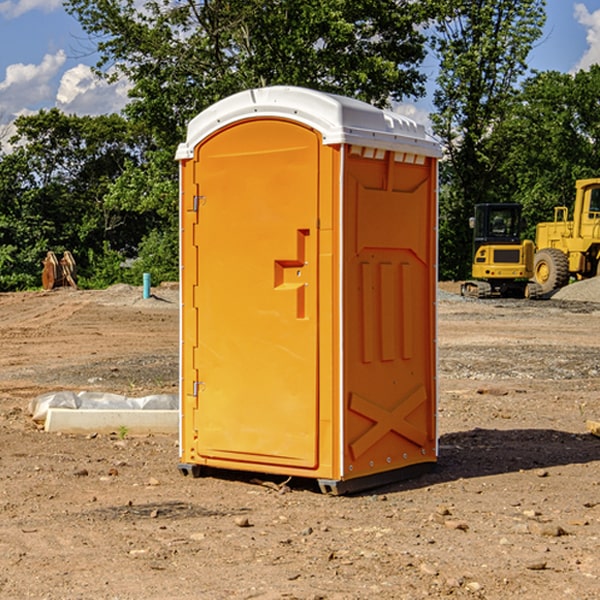 how often are the porta potties cleaned and serviced during a rental period in Scott Bar